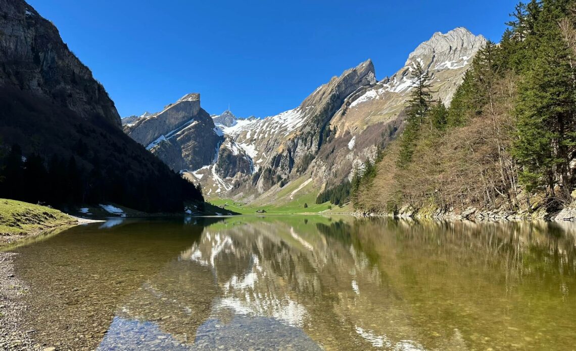 The Seealpsee hike from Ebenalp is one of the most beautiful hikes in Appenzell. Read our experience, tips, route info and hiking with a baby.