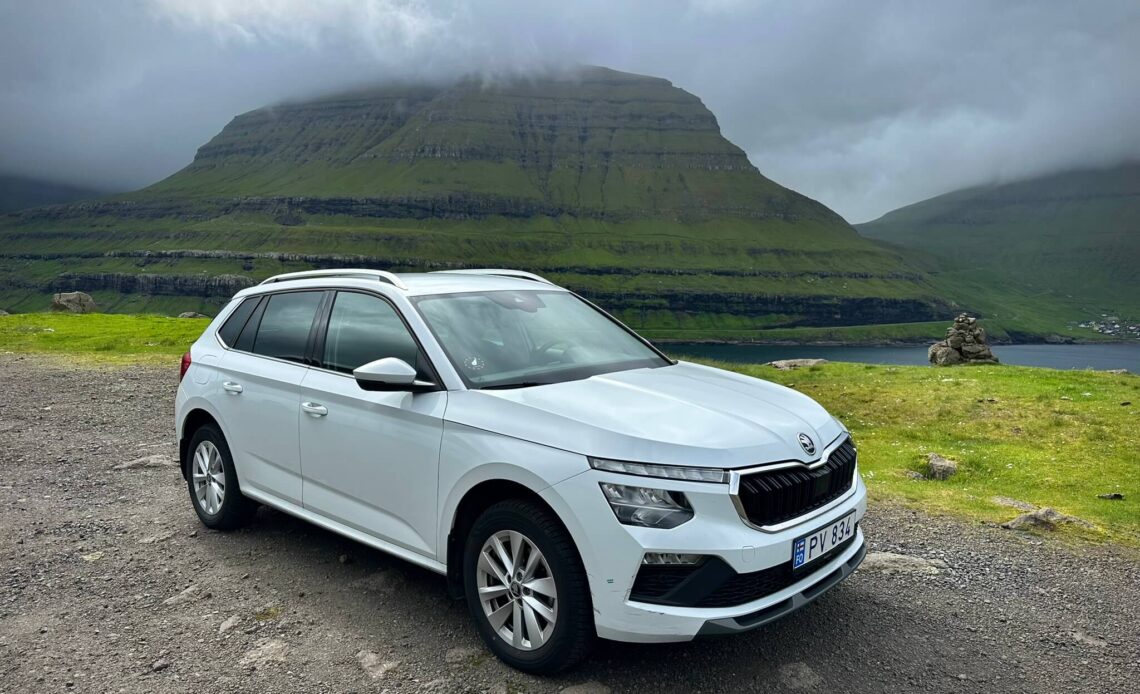 Renting a car in the faroe islands - driving past sheep narrow roads and tunnels
